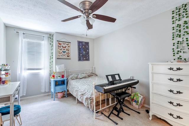 178 S Peach Tree Ln, Republic, MO 65738 - bedroom featuring light colored carpet, a textured ceiling, baseboards, and ceiling fan