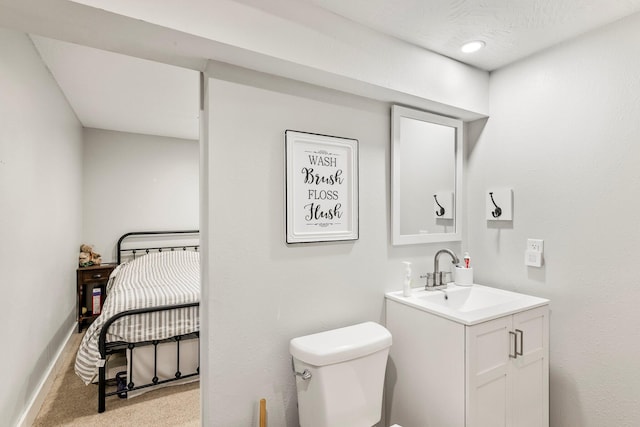 178 S Peach Tree Ln, Republic, MO 65738 - bathroom featuring toilet, vanity, and baseboards