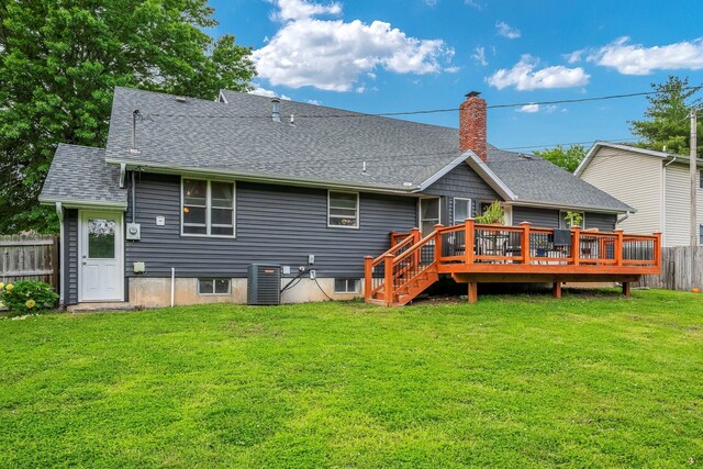 178 S Peach Tree Ln, Republic, MO 65738 - back of property with a shingled roof, a deck, central air condition unit, and a chimney