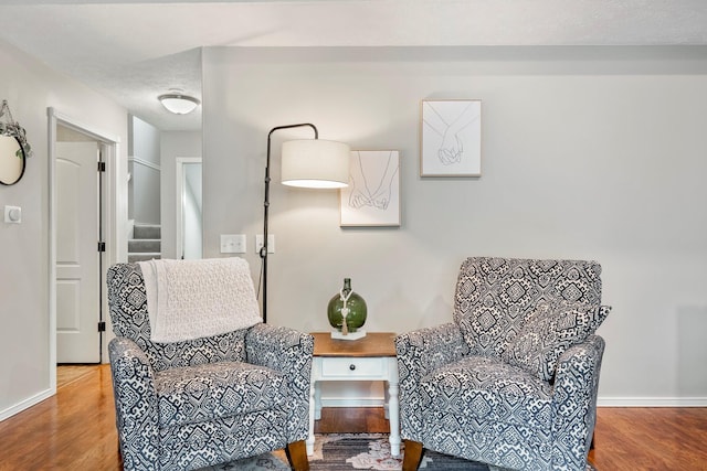 178 S Peach Tree Ln, Republic, MO 65738 - living area with wood finished floors, stairs, and baseboards