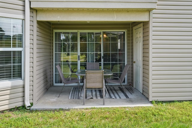 view of patio featuring outdoor dining area