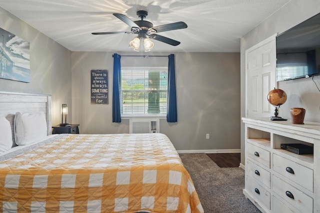 carpeted bedroom with baseboards and a ceiling fan