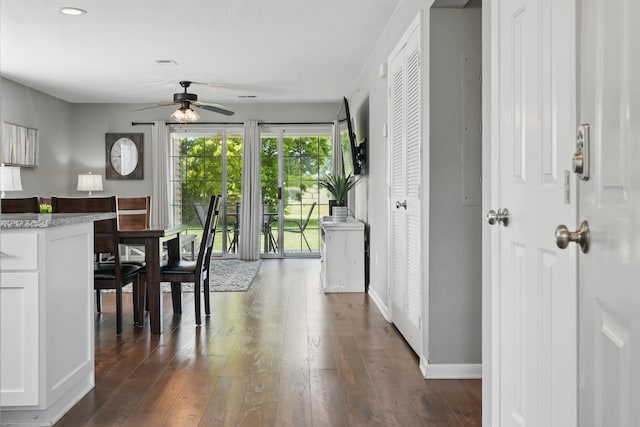 dining room featuring a ceiling fan, dark wood-style flooring, baseboards, and recessed lighting