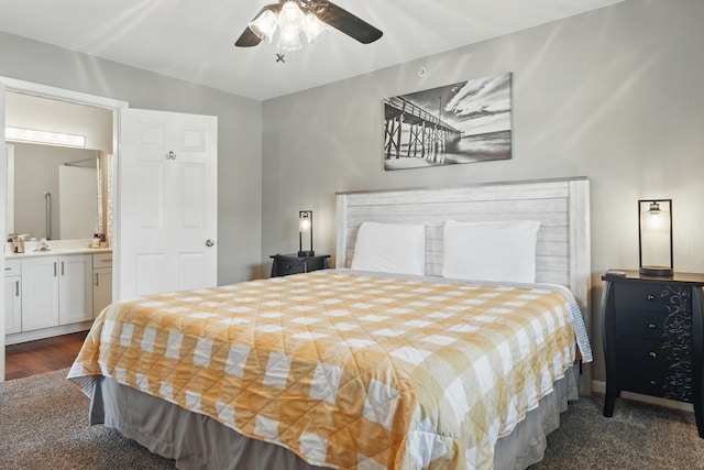 bedroom with dark colored carpet and a ceiling fan