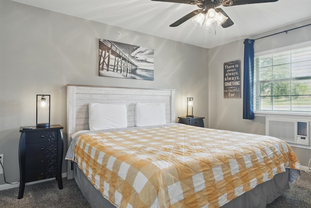 carpeted bedroom with baseboards and ceiling fan