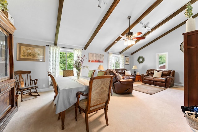 77 Johnson Way Ln, Kimberling City, MO 65686 - carpeted dining space with beam ceiling, healthy amount of natural light, baseboards, a ceiling fan, and high vaulted ceiling