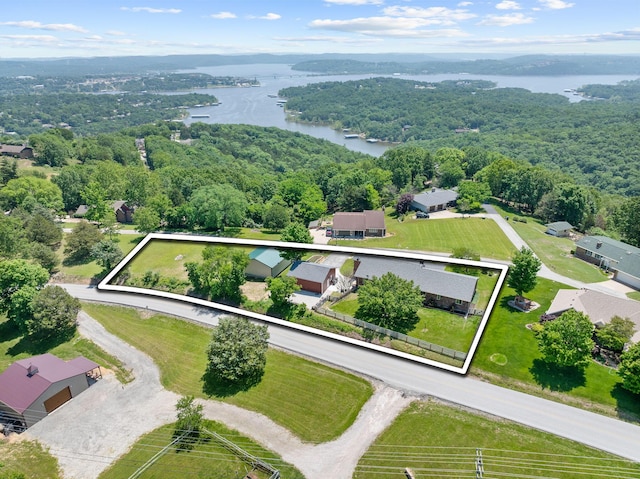 77 Johnson Way Ln, Kimberling City, MO 65686 - aerial overview of property's location featuring a nearby body of water, property parcel outlined, and a heavily wooded area