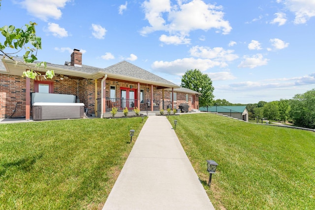 77 Johnson Way Ln, Kimberling City, MO 65686 - back of house featuring french doors, a chimney, brick siding, a lawn, and roof with shingles