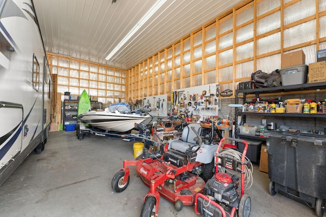 77 Johnson Way Ln, Kimberling City, MO 65686 - garage featuring a workshop area
