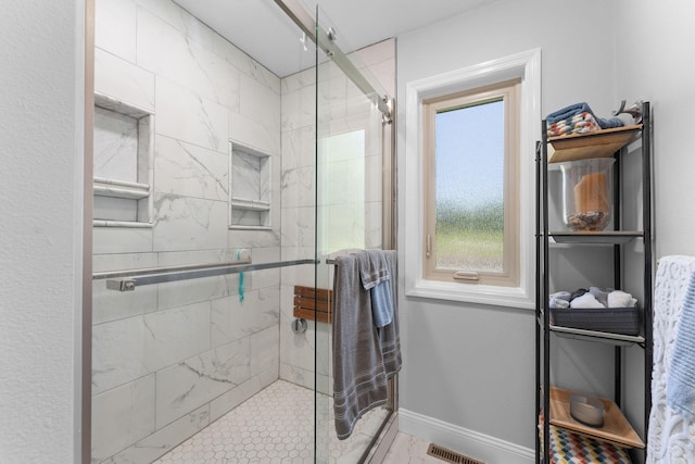 77 Johnson Way Ln, Kimberling City, MO 65686 - bathroom featuring a stall shower and baseboards