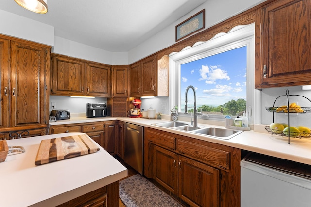 77 Johnson Way Ln, Kimberling City, MO 65686 - kitchen featuring stainless steel dishwasher, a sink, light countertops, fridge, and brown cabinets