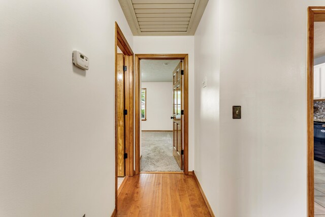 1240 Tyler Ln, Nixa, MO 65714 - hall featuring light wood-style flooring and baseboards