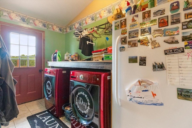 6203 County Road 1750, West Plains, MO 65775 - clothes washing area with washing machine and dryer and tile patterned floors