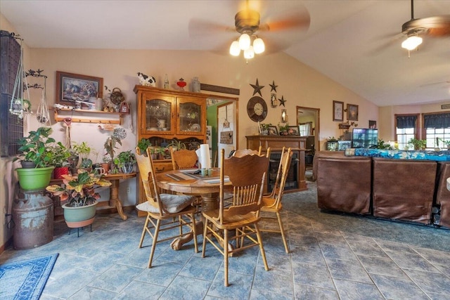 6203 County Road 1750, West Plains, MO 65775 - dining space featuring ceiling fan, lofted ceiling, and stone finish floors