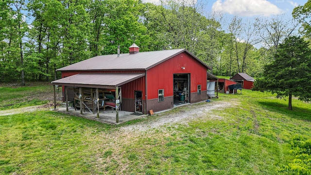 315 Buckskin Rdg, Pineville, MO 64856 - view of pole building featuring a lawn