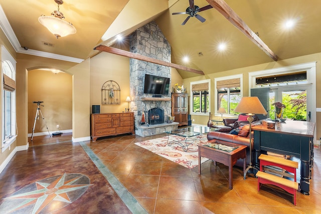 315 Buckskin Rdg, Pineville, MO 64856 - tiled living area with arched walkways, baseboards, a stone fireplace, ceiling fan, and high vaulted ceiling