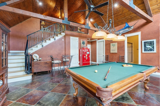 315 Buckskin Rdg, Pineville, MO 64856 - recreation room with wooden ceiling, high vaulted ceiling, beamed ceiling, stone tile flooring, and ceiling fan