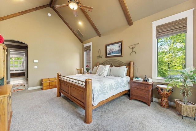 315 Buckskin Rdg, Pineville, MO 64856 - bedroom featuring light carpet, beamed ceiling, high vaulted ceiling, baseboards, and arched walkways