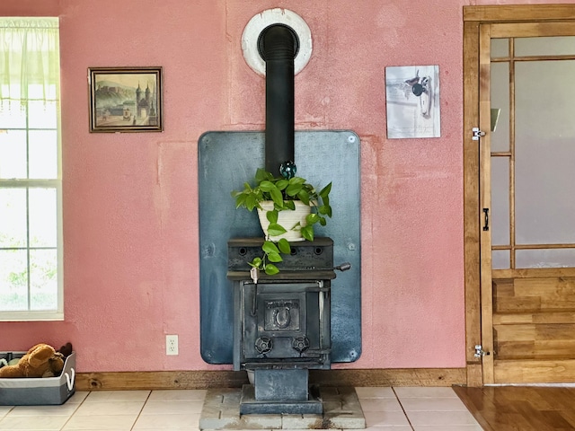 detailed view of a wood stove and baseboards
