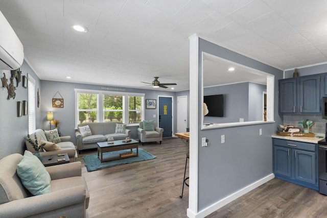 26478 Shadow Rd, Pittsburg, MO 65724 - living area featuring dark wood-style floors, a wall mounted air conditioner, ceiling fan, baseboards, and recessed lighting