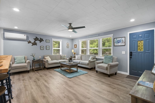 26478 Shadow Rd, Pittsburg, MO 65724 - living area with a wall unit AC, ceiling fan, wood finished floors, baseboards, and recessed lighting