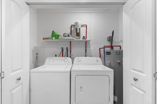 26478 Shadow Rd, Pittsburg, MO 65724 - laundry area featuring electric water heater and independent washer and dryer