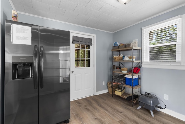26478 Shadow Rd, Pittsburg, MO 65724 - kitchen featuring stainless steel fridge with ice dispenser, ornamental molding, wood finished floors, and baseboards