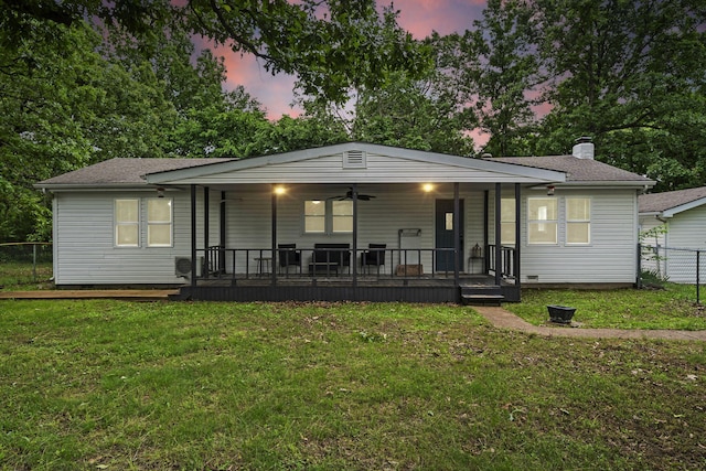 26478 Shadow Rd, Pittsburg, MO 65724 - back of house with ceiling fan, a porch, a chimney, and a shingled roof