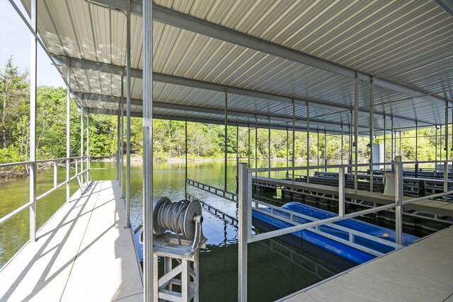 452 Rest Haven Ln, Blue Eye, MO 65611 - dock with a water view, view of scattered trees, and boat lift