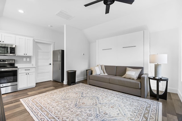 452 Rest Haven Ln, Blue Eye, MO 65611 - living area featuring ceiling fan, dark wood-style floors, baseboards, recessed lighting, and lofted ceiling