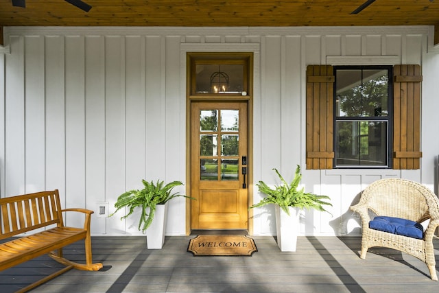452 Rest Haven Ln, Blue Eye, MO 65611 - doorway to property with covered porch, ceiling fan, and board and batten siding
