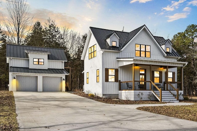 452 Rest Haven Ln, Blue Eye, MO 65611 - modern farmhouse with a porch, a standing seam roof, driveway, board and batten siding, and metal roof