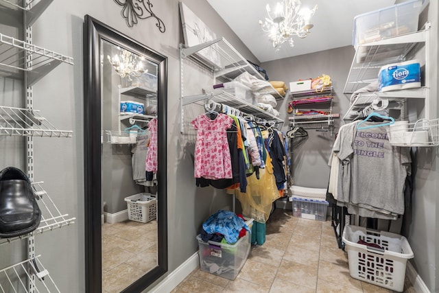 103 Dogwood Ct, Saddlebrooke, MO 65630 - walk in closet with a chandelier