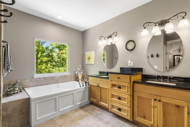 103 Dogwood Ct, Saddlebrooke, MO 65630 - full bath with double vanity, a bath, and tile patterned floors