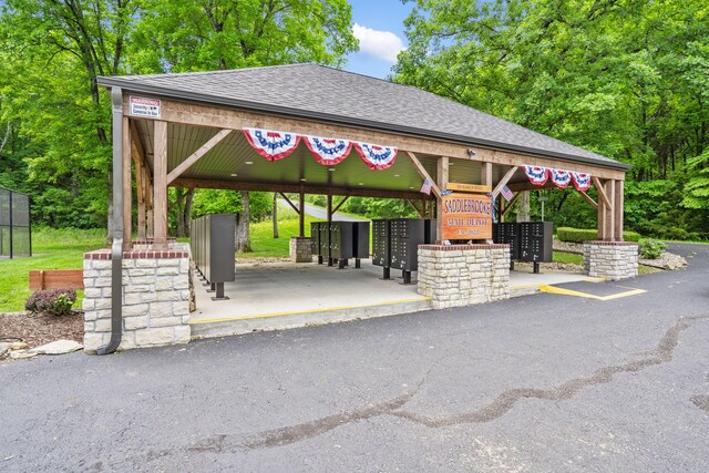 103 Dogwood Ct, Saddlebrooke, MO 65630 - view of community with mail area and a carport