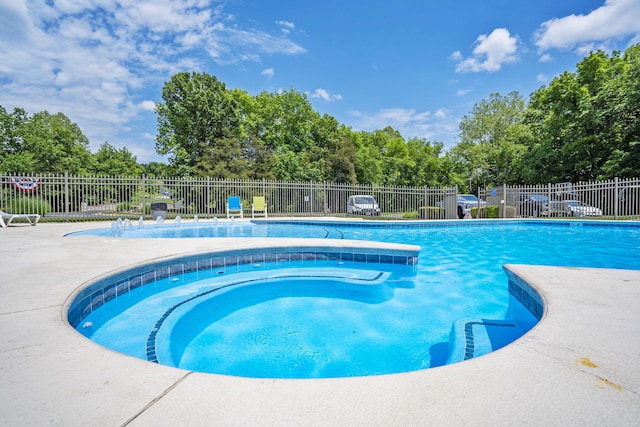103 Dogwood Ct, Saddlebrooke, MO 65630 - community pool featuring fence and view of scattered trees