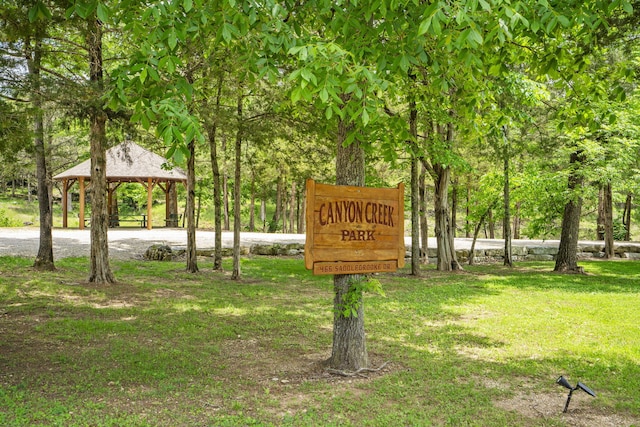 103 Dogwood Ct, Saddlebrooke, MO 65630 - surrounding community featuring a gazebo and a lawn