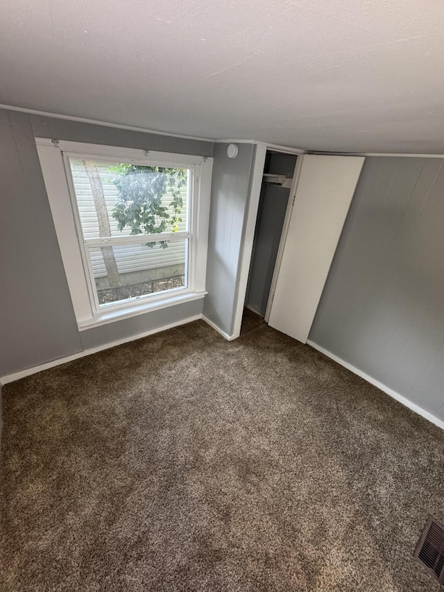 2007 N Travis Ave, Springfield, MO 65803 - unfurnished bedroom with carpet flooring and baseboards