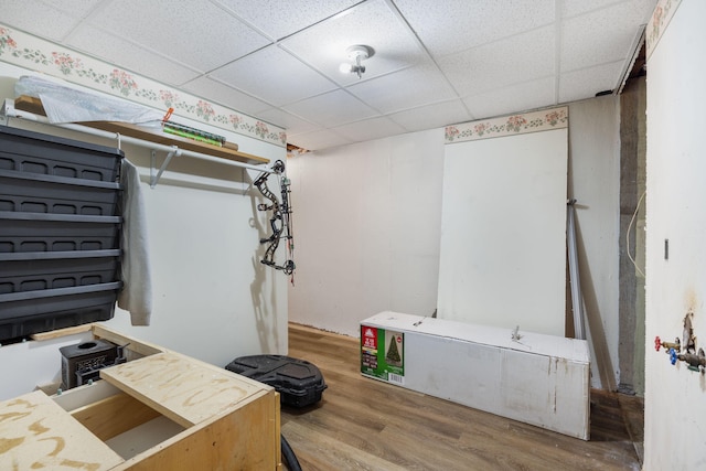 3662 N Farm Rd Unit 127, Springfield, MO 65803 - finished basement with wood finished floors and a drop ceiling
