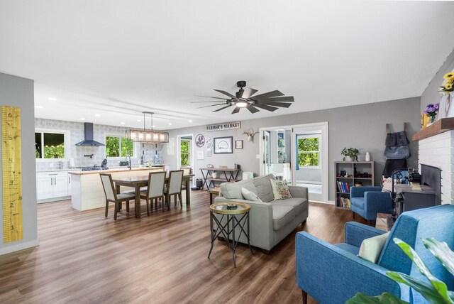 3662 N Farm Rd Unit 127, Springfield, MO 65803 - living room featuring wood finished floors, recessed lighting, healthy amount of natural light, and ceiling fan