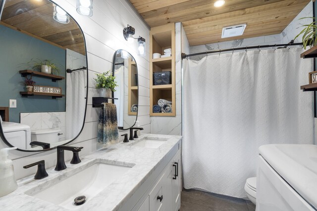 3662 N Farm Rd Unit 127, Springfield, MO 65803 - full bathroom with toilet, wood ceiling, curtained shower, and double vanity