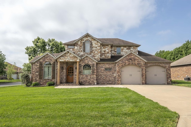 1411 N Cooper Blvd, Springfield, MO 65802 - view of front of home with concrete driveway, a front yard, an attached garage, a shingled roof, and central air condition unit