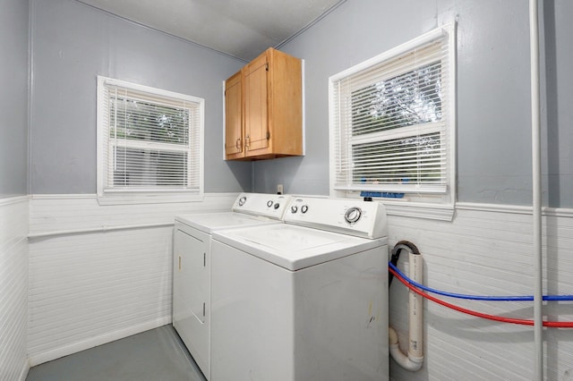 2708 N Fremont Ave, Springfield, MO 65803 - laundry room featuring cabinet space, washer and dryer, and wainscoting