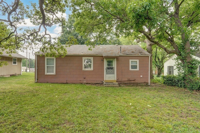 2708 N Fremont Ave, Springfield, MO 65803 - back of house with a lawn and entry steps