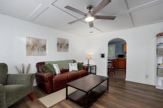 2708 N Fremont Ave, Springfield, MO 65803 - living room featuring dark wood-style flooring, ceiling fan, arched walkways, baseboards, and coffered ceiling