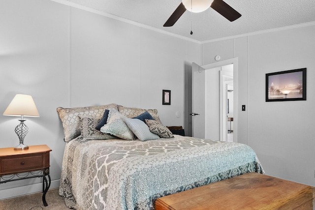 bedroom featuring carpet flooring, crown molding, a ceiling fan, and a textured ceiling