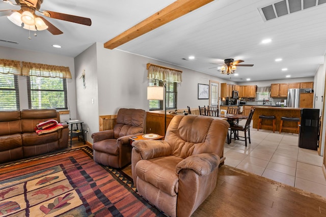 229 Grand Slam Ave, Cape Fair, MO 65624 - living area featuring ceiling fan, plenty of natural light, recessed lighting, beam ceiling, and light wood finished floors