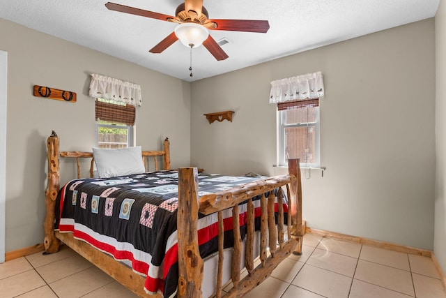 229 Grand Slam Ave, Cape Fair, MO 65624 - bedroom featuring baseboards, tile patterned floors, and ceiling fan