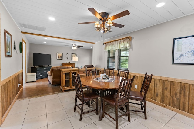 229 Grand Slam Ave, Cape Fair, MO 65624 - dining space featuring wainscoting, wooden walls, a ceiling fan, light tile patterned floors, and recessed lighting