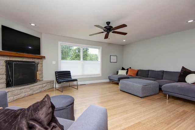 700 E Delmar St, Springfield, MO 65807 - living area with wood finished floors, a fireplace, ceiling fan, recessed lighting, and baseboards